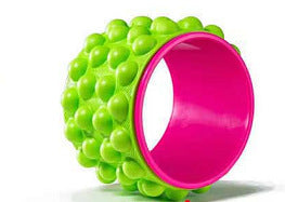 Green and pink textured ring on a white background